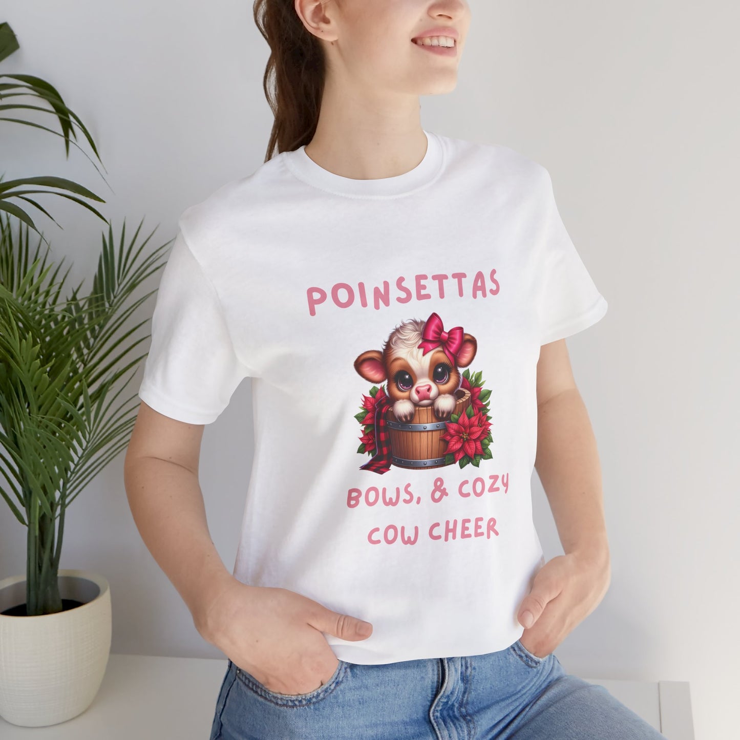Cute Cow Poinsettia bows and cozy cow cheer Tee, Holiday Shirt, Cozy Unisex T-Shirt, Christmas Gift, Festive Apparel, Farm Animal Tee