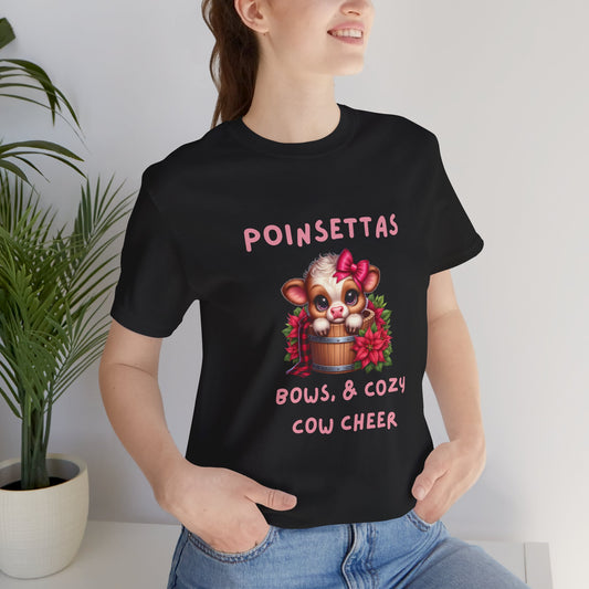 Cute Cow Poinsettia bows and cozy cow cheer Tee, Holiday Shirt, Cozy Unisex T-Shirt, Christmas Gift, Festive Apparel, Farm Animal Tee
